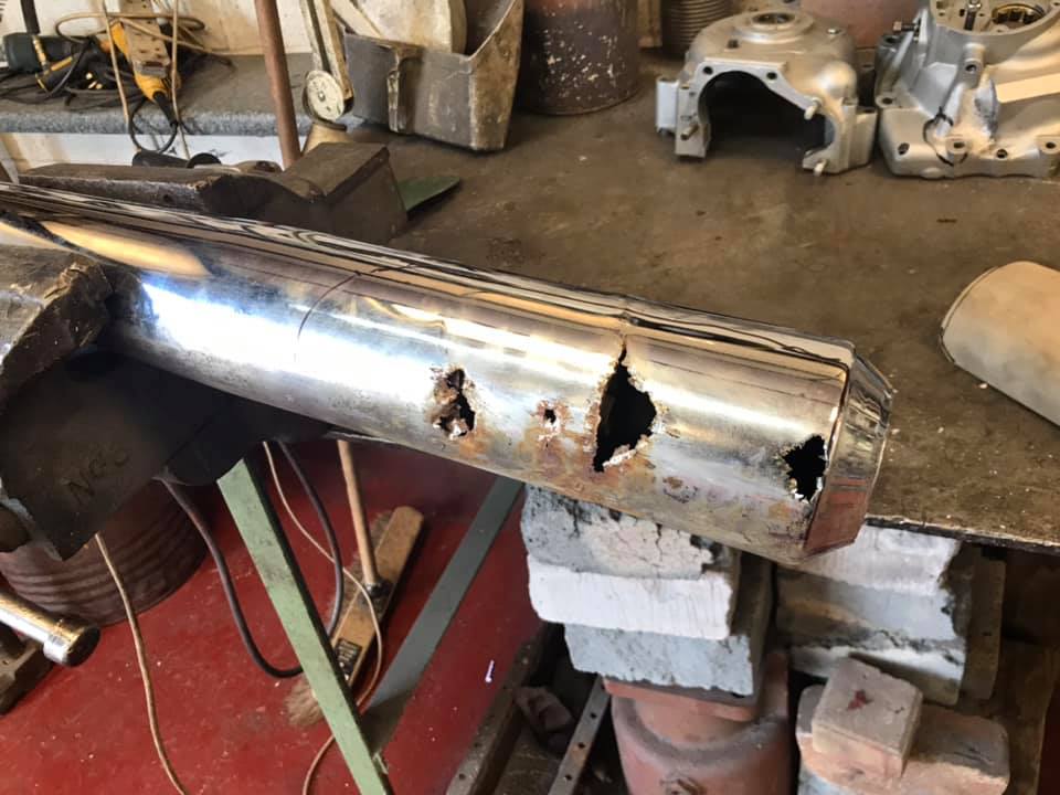 Motorcycle exhaust before repair
